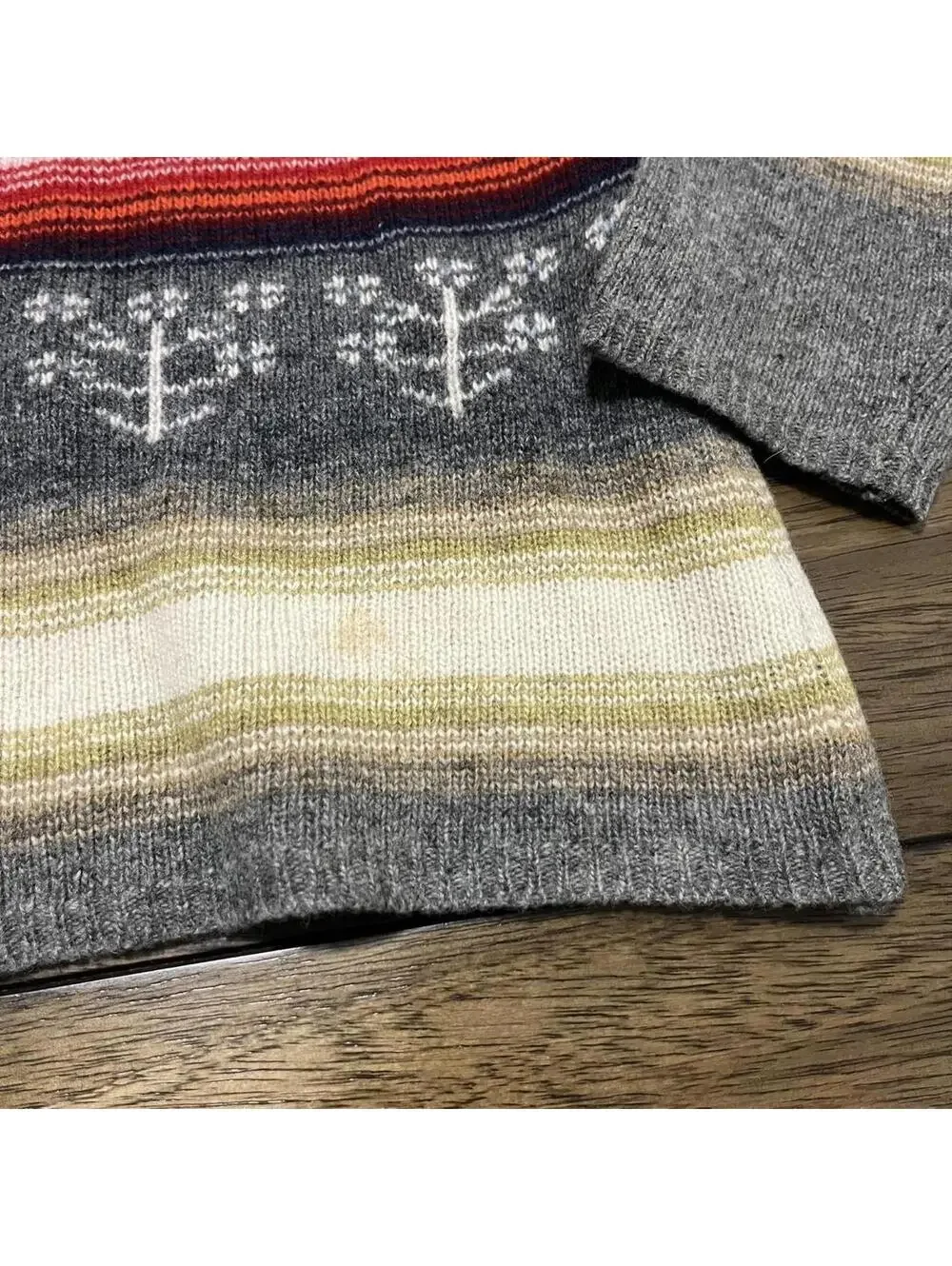 Free people grey sweater with red stripes and flower pattern